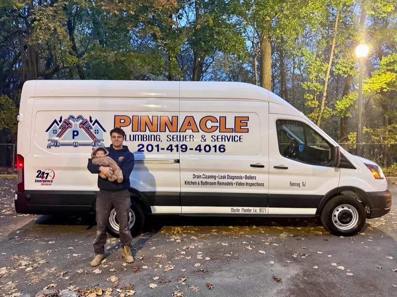 Drew Ryder with his daughter - Owner of Pinnacle Plumbing